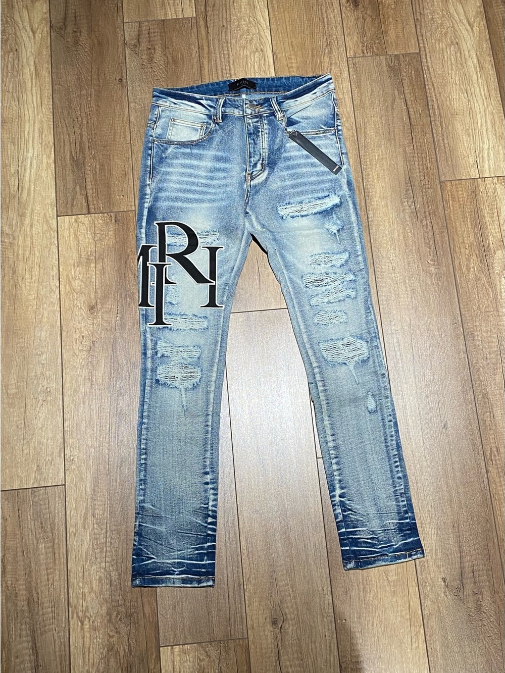 Amiri Light Blue Skinny Ripped Jeans with Black Logo Mens Waist Size 30